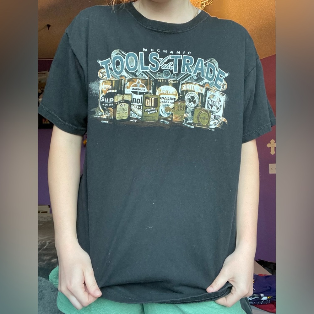 Black “Mechanic tools of the trade” t-shirt with oil can graphics